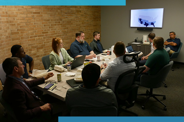 contigo technology employees having a meeting